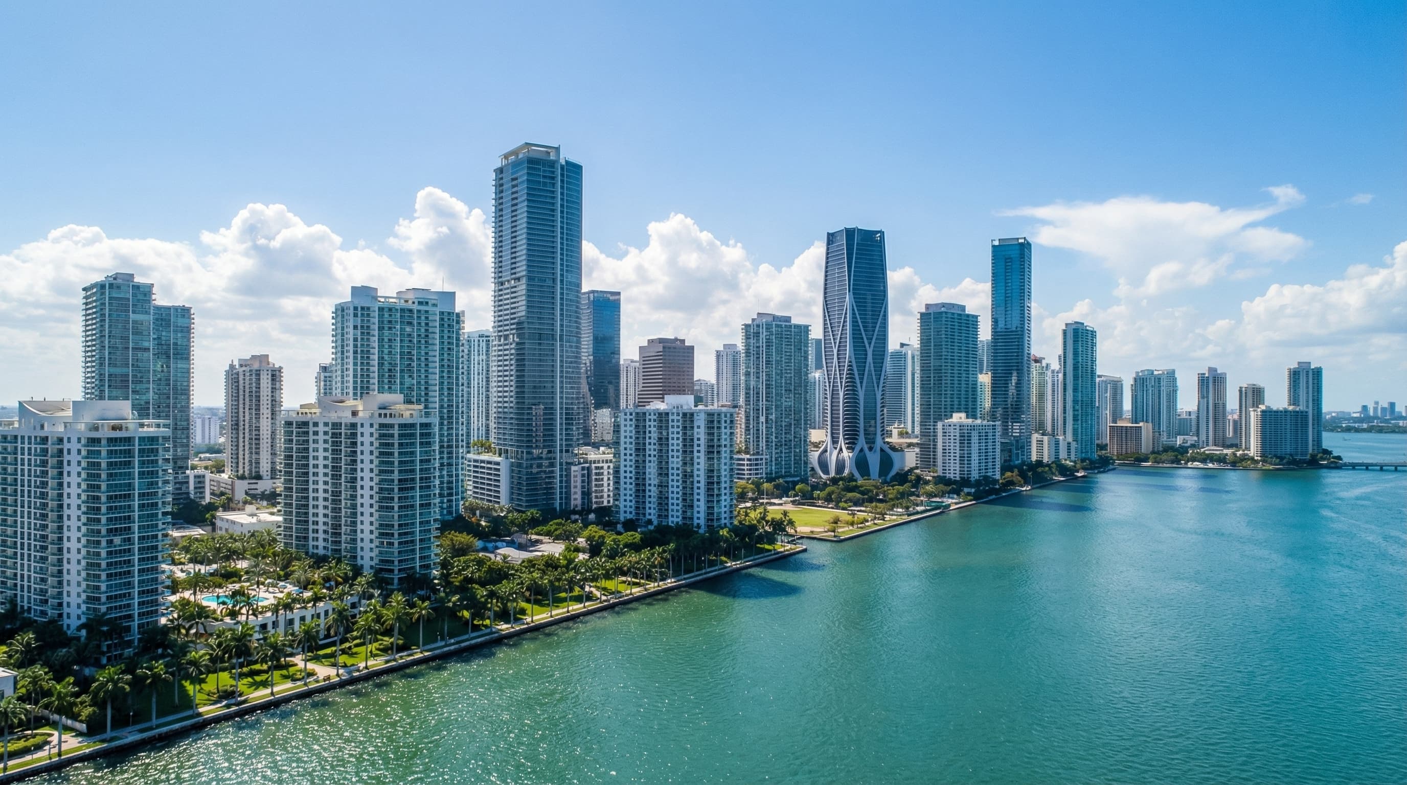 Aerial view of Miami Florida skyline with Biscayne Bay, South Beach, and downtown towers at sunset