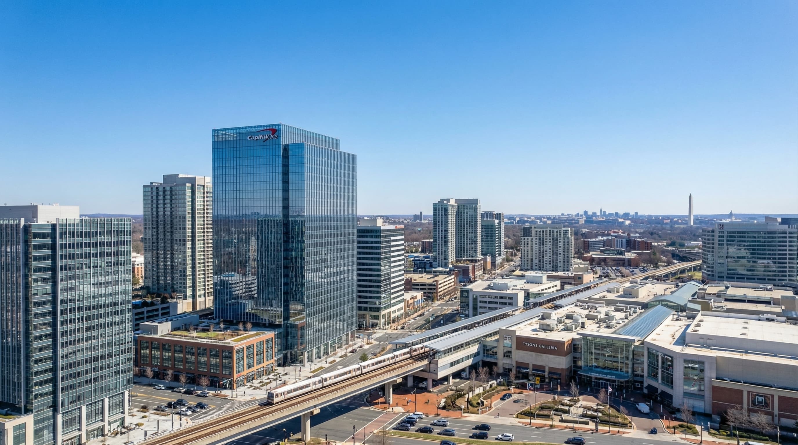 Tysons Virginia urban skyline with high-rise towers, Metro station, and mixed-use development